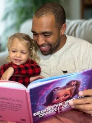 Kathy Dupea's child with their Adorabook